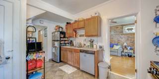 Charming 5-Bedroom Home with Exposed Brick and Modern Upgrades Gallery 10