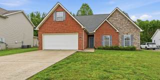 Charming Brick Home with Open Layout & Spacious Backyard in Pleasant View Gallery 3