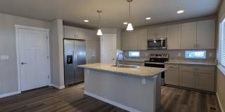 4 Bedrooms | 3.5 Bathrooms | 2-Car Garage | Finished Walkout Basement | Fenced Yard | Pikes Peak Views Gallery 4