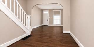 Charming Baltimore Rowhome with Hardwood Floors & Bonus Basement Space Gallery 4