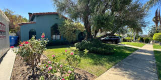 Beautiful Spanish Style Home with Lush Yard Gallery 1