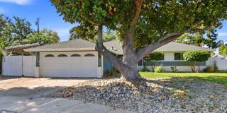 Available Now! Charming Ranch with Versatile Bonus Rooms and Garden Retreat Gallery 1