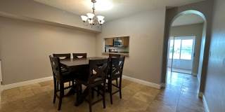 Beautiful Townhome in a gated community with assigned parking spots and a community pool Gallery 7