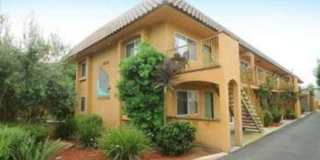 Upstairs end unit with AC and a private entrance 2 bedroom condo in a quiet area of Spring Valley with a one car garage and a parking spot Gallery 1