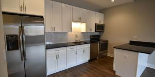 3833 N Broadway Gallery 85