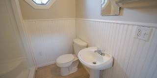 Bright, beautiful home with 3 garage spaces & tons of storage! Gallery 13