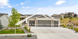 Main Floor Primary Home in Flying Horse with 5 Bedrooms, Gourmet Kitchen, Finished Basement & 4-Car Garage Gallery 1