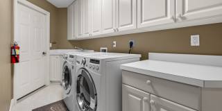 Experience Bell Tower Park. GATED ground floor 2 Bed 2 Bath Den 1 Car Garage Condo. Gallery 23