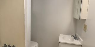 Great 2 bed 2 bath with bonus attic space house located steps from shopping. Gallery 7