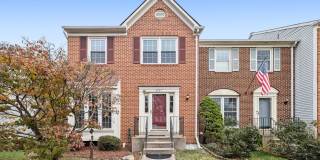 Modern Brick End-Unit Townhome with Stunning Upgrades and Serene Wooded Views Gallery 1