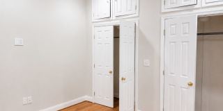 Updated One-Bedroom with In-Unit Laundry and Private Porch Near Shaw Gallery 9