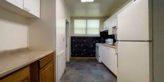 For Rent: 912 S Penn St. Cozy 3-Bedroom Home with a fenced in yard & detached garage! Washer & Dryer Hookups! Section 8 Approved! Gallery 1