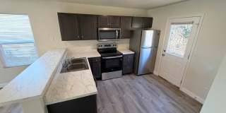 Spacious 4-Bedroom 2-Bath Home with Attached 1-Car Garage Move In Ready Gallery 1