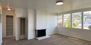 1BR/1BA Charmer! BAY VIEWS and Parking! Laundry On-Site! Balcony! PROGRESSIVE Gallery 1