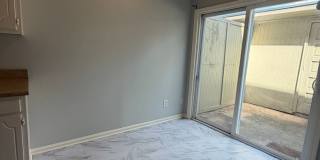Prime Quail Hollow location! End-unit townhome with private patio, pool access, and HOA-covered maintenance - pets welcome. Gallery 9
