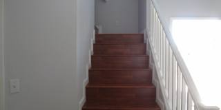 THIS 1,596 SQ. FT. HOME HAS 3 BEDROOMS, 2.5 BATHROOMS, A 2 CAR GARAGE LOCATED ON A CORNER LOT AND NEW WOOD FLOORING Gallery 4