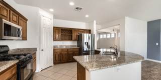 Beautiful 4 Bedroom Home With Solar, 3 Car Tandem Garage, and Nice Backyard! Gallery 6
