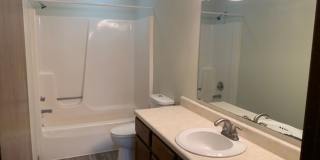 2 BR, 1.5 BA Clive split level duplex.  Deck and one car attached garage. Gallery 15