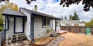 Charming Single-Story Home with Modern Updates, Detached Garage & Garden Bed Gallery 1