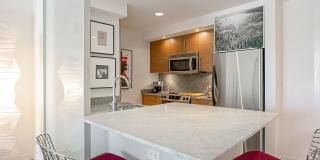 Gorgeous designer one bedroom in Hayes Valley w/lots of light, views, W/D, private patio, roof deck, gym and parking! Gallery 13