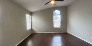 Single-level 3-bedroom home in a desirable Chandler location featuring a 2-car garage and tile roof and wood plank flooring throughout Gallery 22