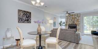 Discover this beautifully updated Raintree townhome featuring an open floor plan and a range of contemporary enhancements. Gallery 11