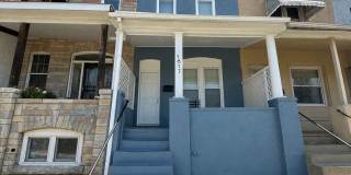 Charming Baltimore Rowhome with Updated Kitchen, Covered Front Porch & Basement Charming Baltimore Rowhome with Updated Kitchen, Covered Front Porch & Basement Gallery 1