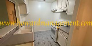 Bonus Den! Beautiful lower condo with large patio in Tara Hills, a resort style living complex! Gallery 7