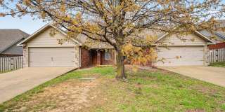 Welcome to this stunning 3-bedroom, 2-bathroom home located in the vibrant city of Bentonville, AR Gallery 1