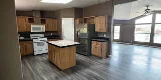 Spacious 4-Bedroom Home with Large Fenced Yard Gallery 1