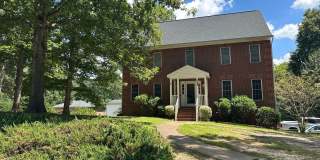 Brick Colonial with unfinished basement and attached garage Gallery 1