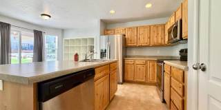 3 Bedroom Murray Townhome with Bonus Basement Suite, Garage & Backyard Gallery 1