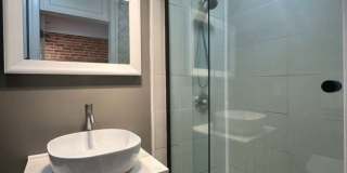 Stylish 2 Bedroom with Spa Bath, Hardwood Floors and Parking Gallery 23