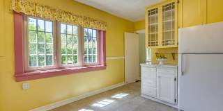 Historic 4-Bedroom Stone Home with Timeless Character, Hardwood Floors, Spacious Living & a Large Private Yard Gallery 16