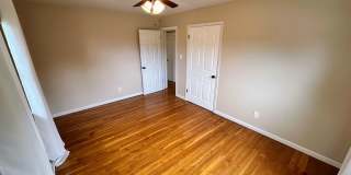 AVAILABLE NOW! Spacious 4 BR, 2 Bath House! Wood Floors, Attached Garage, W/D Included Gallery 15