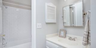 Discover this beautifully updated Raintree townhome featuring an open floor plan and a range of contemporary enhancements. Gallery 22