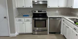 East side! Updated! Granite counter tops! Hard surface flooring throughout! Gallery 14