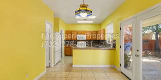 NW!! 4 Bedrooms!!! All Tile and Pergo flooring T/O!! NO Carpet!!! Low Maintenance Desert landscaping front and back!! With Patio cover in back!!! Gallery 17