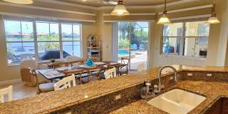 Seasonal Short-Term 4 Bedroom 3 Bathroom Heated Pool Home located in Venetian Golf & River Club! Gallery 31