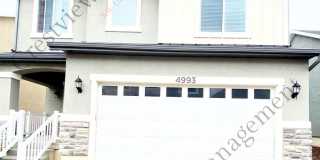 Spacious 3-Story Townhome with Open Living & 2-Car Garage Gallery 1