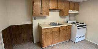 Great 2 bed 2 bath with bonus attic space house located steps from shopping. Gallery 8