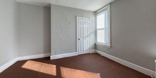 Classic 2-BR Rowhouse with Exposed Brick in Hunting Park Gallery 8