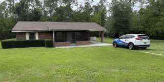 Newly renovated, new painted on large lot - mowing included in rent! Gallery 1