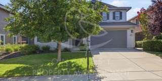 spacious 4-bedroom, 2.5-bathroom home in the desirable Whitney Ranch Gallery 1