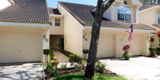 First floor condo in gated East Lake Woodlands of Oldsmar with one car garage Gallery 1