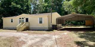 Available Soon! 3 bedroom, 2 bath home with carport and shed! Gallery 1