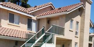 Gorgeous 2 bedroom newly renovated upstairs corner condo in gated community with pool & hill side views! Gallery 1