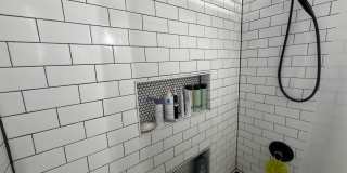 Beautifully updated & maintained 2 bed/2 bath Noble Square condo in an intimate 3 unit building. Gallery 16