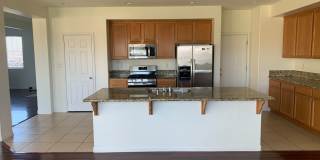 4 Bedroom Home with Paid Solar, 3-Car Garage & Large Backyard Gallery 4