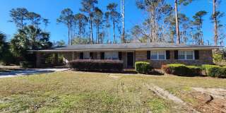 Spacious 3-Bedroom Brick Home with Two Living Areas  Fenced Backyard! Gallery 1